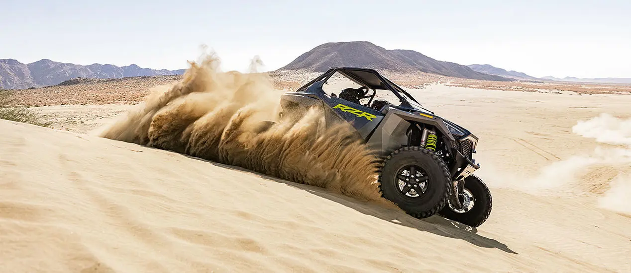 polaris rzr turbo r driving in the desert