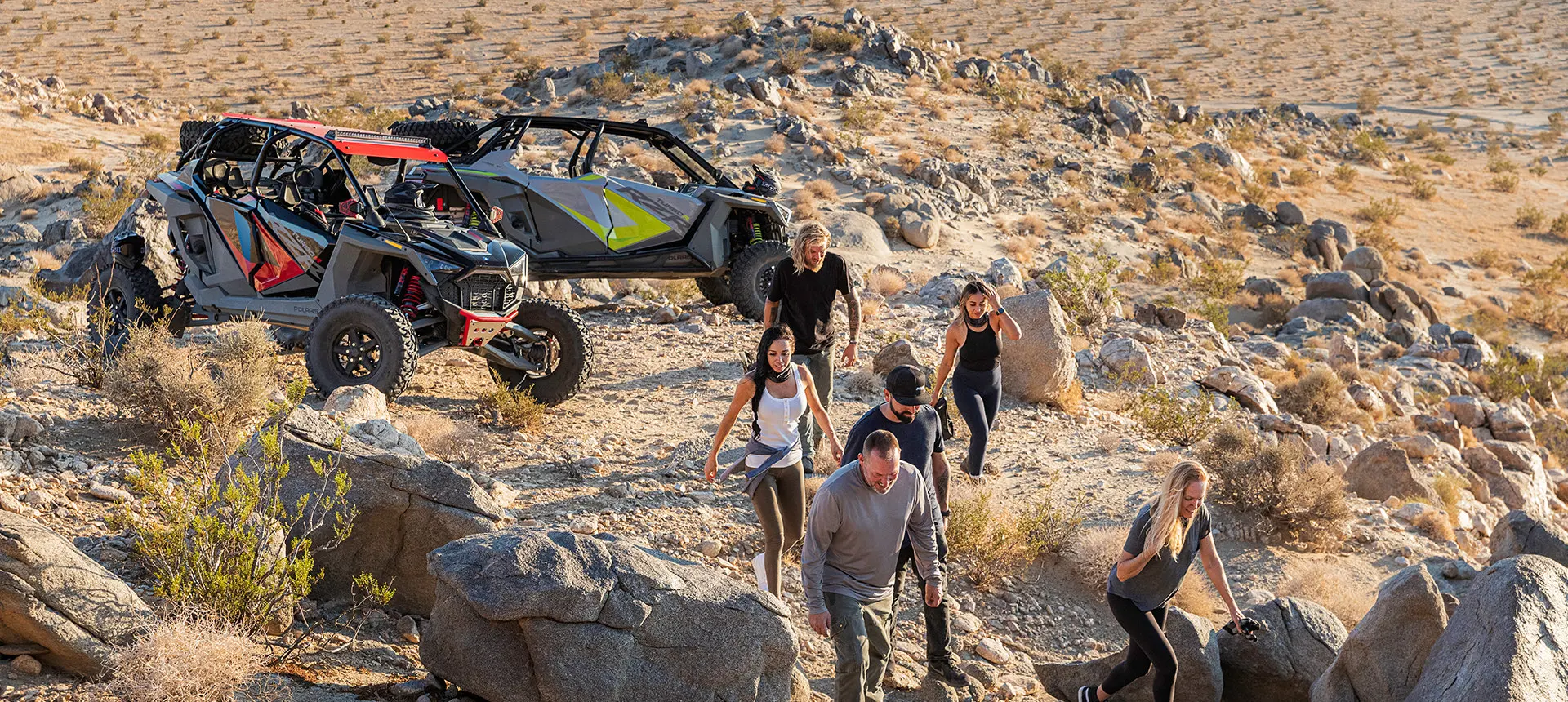 rzr riders climbing rocks after a ride