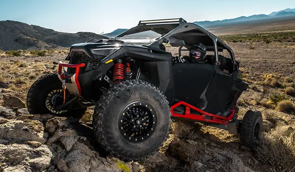 rzr pro r 4 side by side climbing over rocky terrain