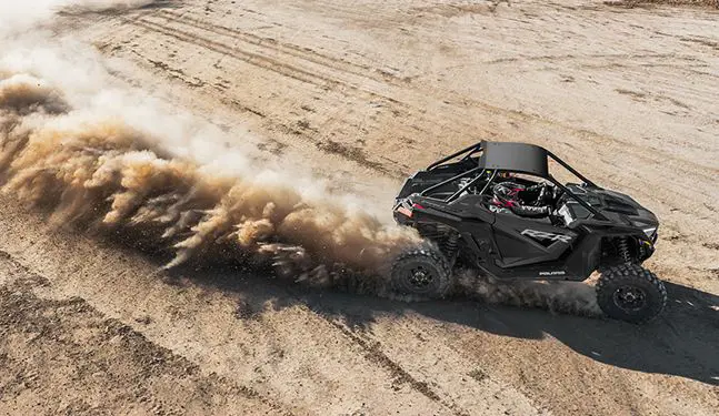 aerial view of a polaris rzr pro xp side by side in the desert