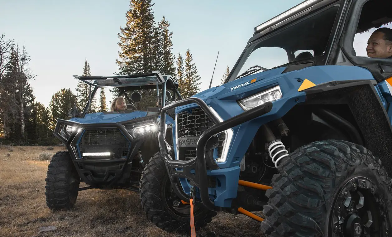 front ends of 2 polaris rzr trail s side by side