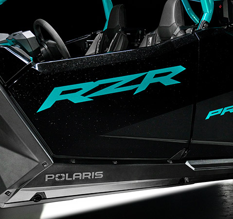 Close-up of the new solid half doors with double latch and door seal on a 2025 Polaris RZR Pro R side-by-side.