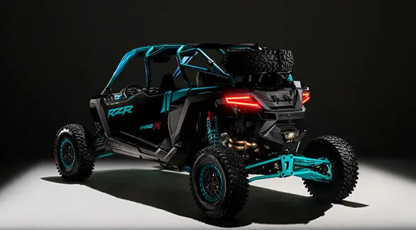 Rear-side view of a 2025 Polaris RZR Pro R 4 side-by-side.