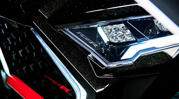 Close-up of the headlights on a 2025 Polaris RZR Pro R side-by-side.