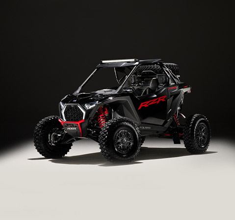 Side profile of a Onyx Black 2025 Polaris RZR Pro S side-by-side featuring the new exterior style.