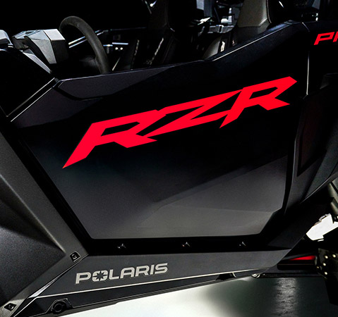 Close-up of the new solid half doors with double latch and door seal on a 2025 Polaris RZR Pro S side-by-side.