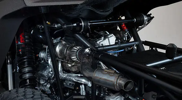 Close-up of the turbocharged engine and exhaust system on a 2027 Polaris RZR Pro R Factory Boost SxS.
