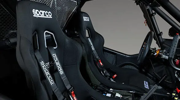 Close-up of Sparco racing seats and harnesses inside a 2027 Polaris RZR Pro R Factory Boost SxS.