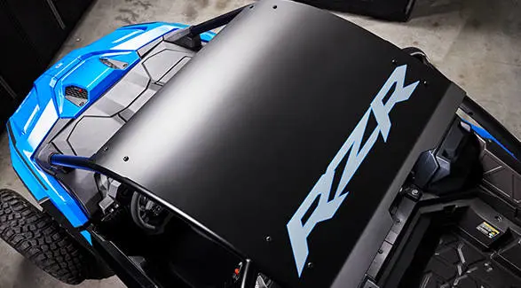 Overhead view focusing on the sleek black roof and interior cockpit of the RZR Pro R Ultra Edition Velocity Blue.