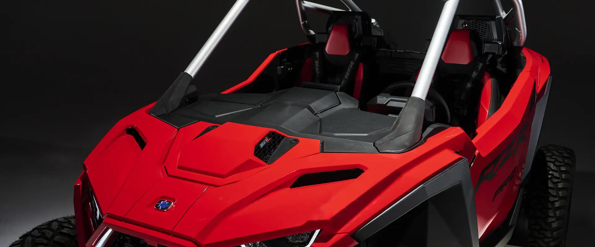 Overhead view of the hood on a Indy Red 2026 Polaris RZR Pro R SxS.