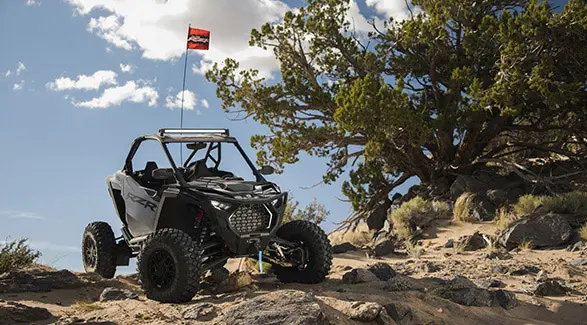 2026 Polaris RZR Pro S Ultimate SxS in Slate Gray parked on sandy/rocky terrain.