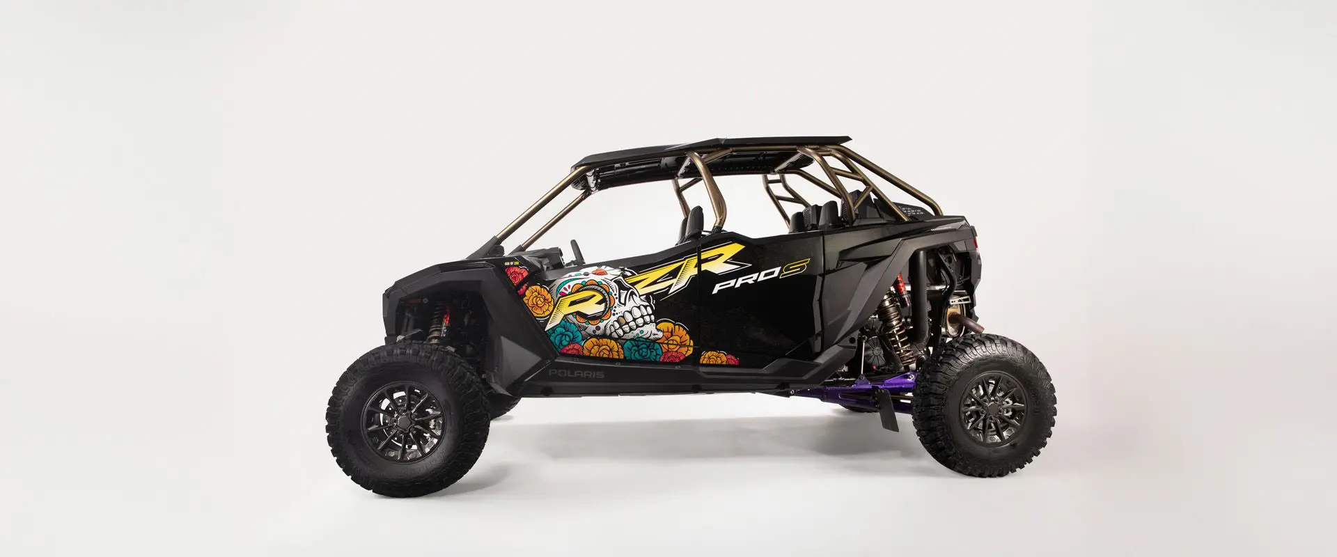 Driver-side view of the 2026 Polaris RZR Pro S 4 Ultimate Calavera LE SxS.