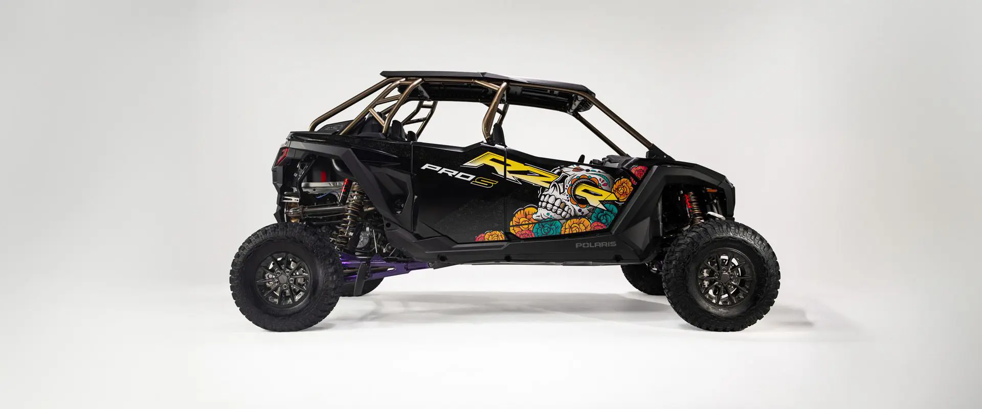Passenger-side view of the 2026 Polaris RZR Pro S 4 Ultimate Calavera LE SxS.