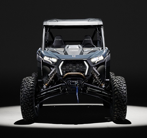 Front end view of a 2026 Polaris RZR XP S side-by-side showcasing the RZR Fang Lighting.
