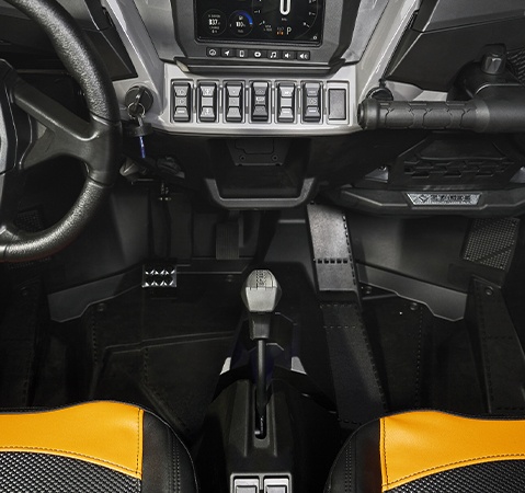 Closeup of the gear selector inside a 2026 Polaris RZR XP S side-by-side showcasing the upgraded shifting mechanism.