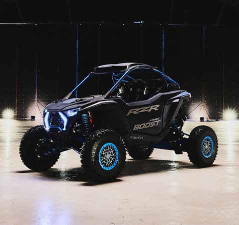 The 2027 Polaris RZR Pro R Boost side-by-side showcasing it's muscular design.