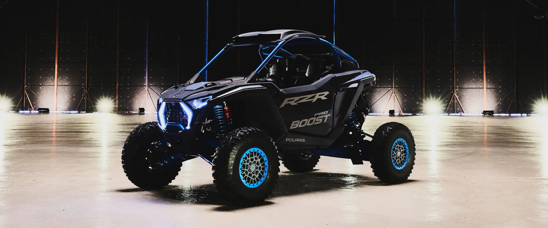 Side profile of the 2027 Polaris RZR Pro R Boost side-by-side.
