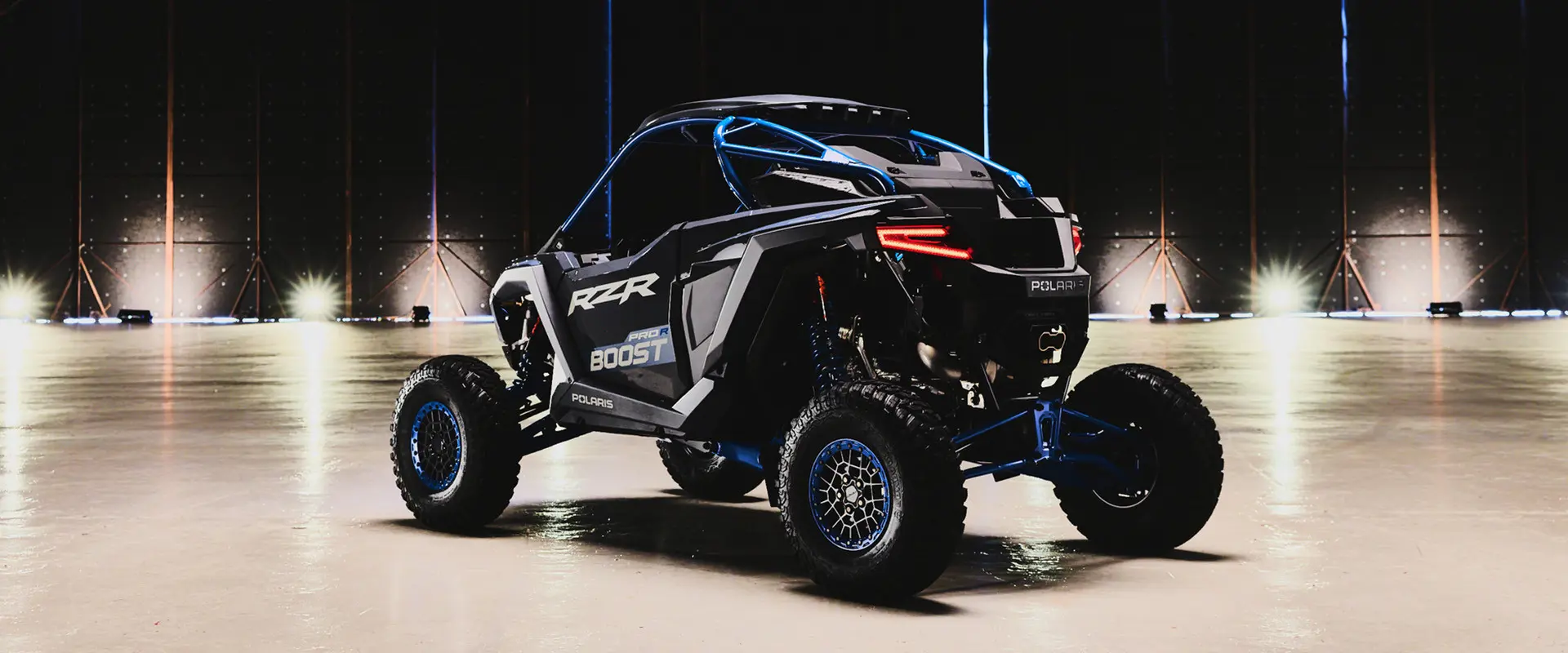Side-rear view of the 2027 Polaris RZR Pro R Boost side-by-side.