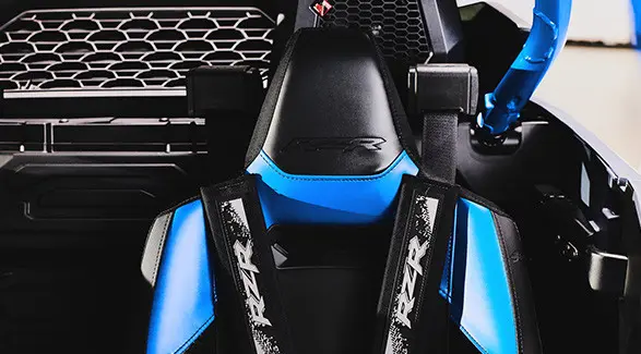 Seating and seat belt in a 2027 Polaris RZR Pro R Boost side-by-side.