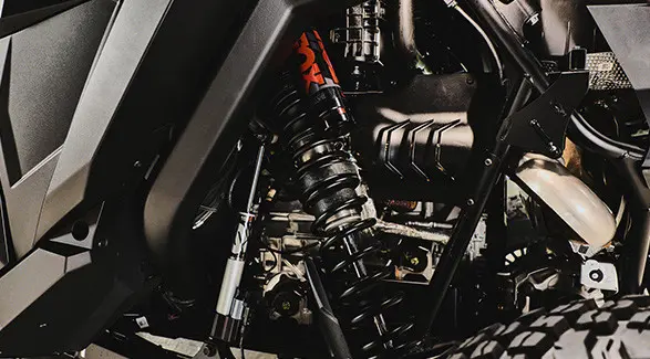 Shocks and undercarriage of a 2027 Polaris RZR Pro R Boost Ultra side-by-side.