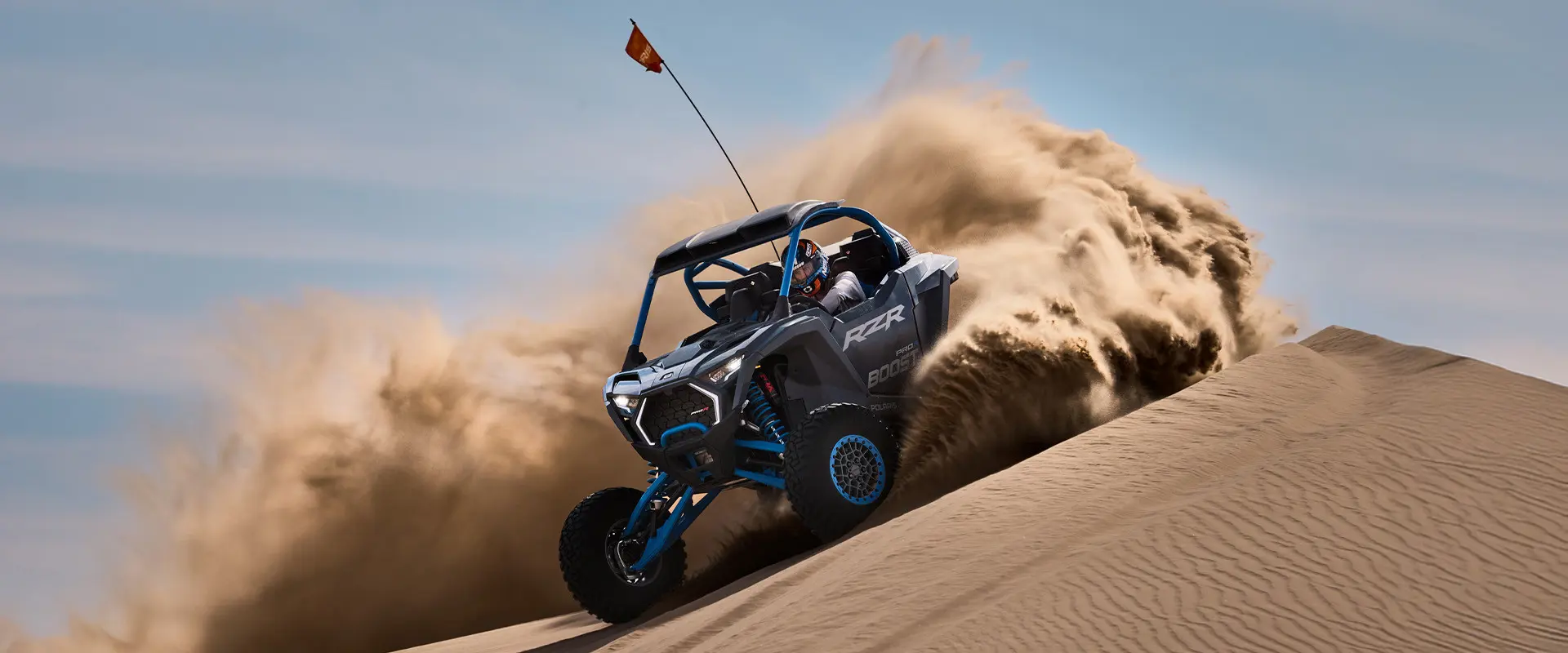 A 2027 Polaris RZR Pro R Boost Ultimate side-by-side conquering the desert.