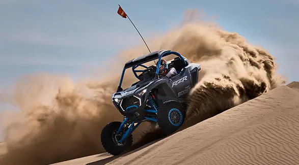 A 2027 Polaris RZR Pro R Boost Ultimate side-by-side conquering the desert.