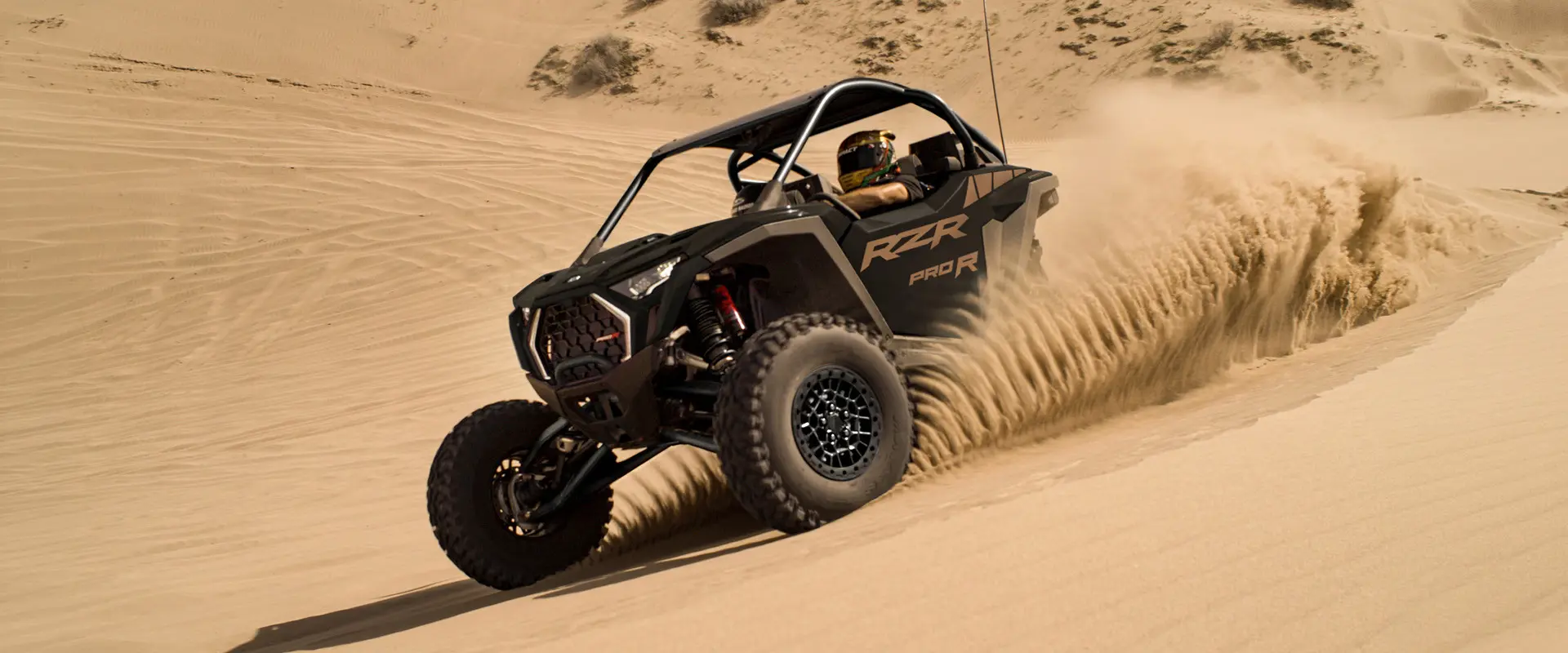 A 2027 Polaris RZR Pro R side-by-side cruising through the desert.