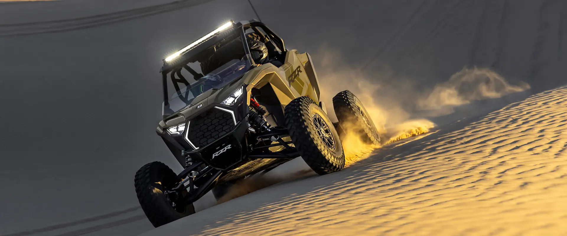 A 2027 Polaris RZR Pro S side-by-side driving through the desert.