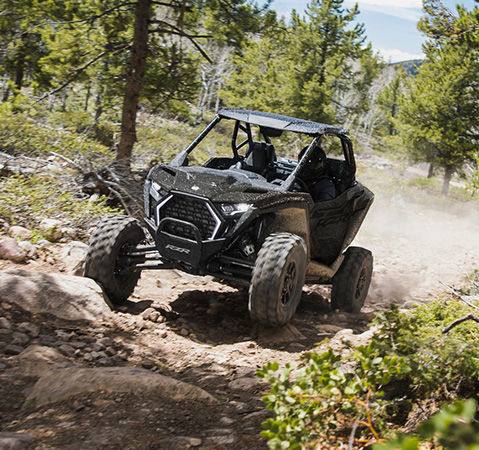 A 2027 Polaris RZR Pro XP side-by-side cruising down a rocky trail.