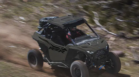 A 2027 Polaris RZR Pro XP side-by-side speeding down a trail.