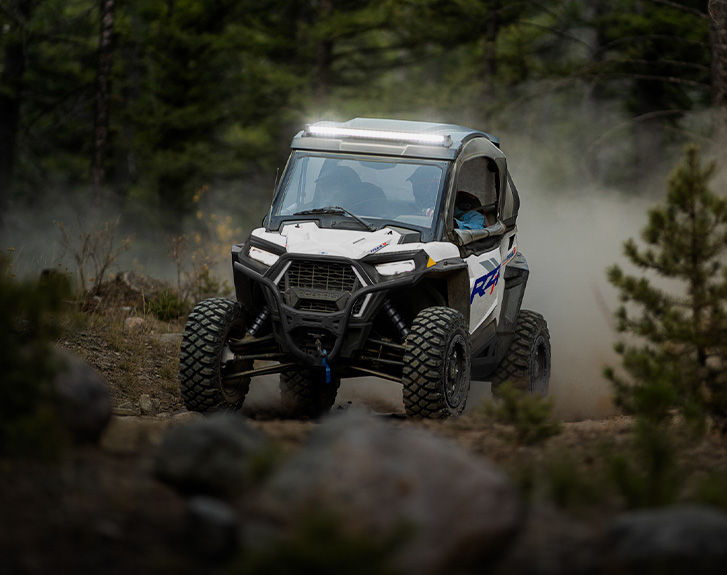 Explore accessories from the Adventurer Package for the 2027 Polaris RZR Trail S side-by-side.