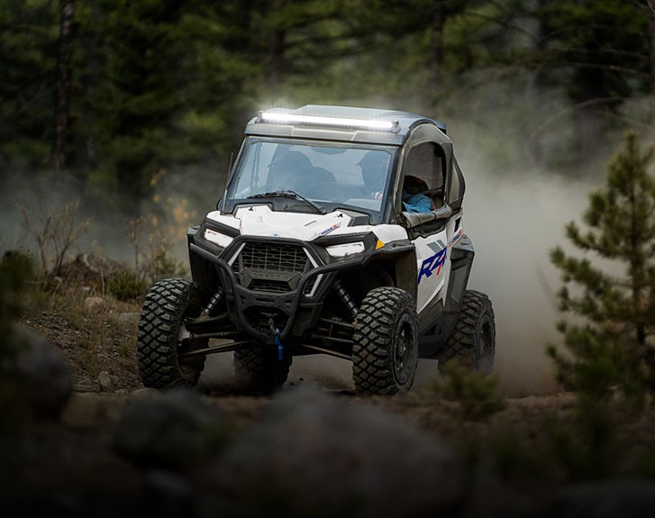 Explore accessories from the Adventurer Package for the 2027 Polaris RZR Trail SxS.