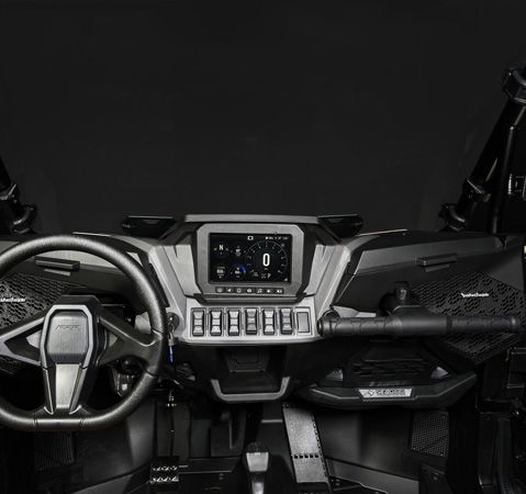 Optimized driver touch points in the interior of a 2027 Polaris RZR XP side-by-side.