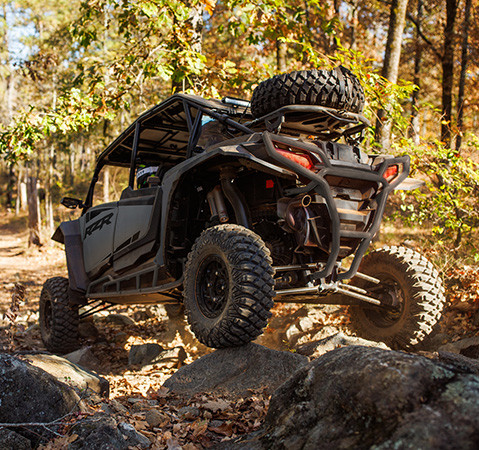 A 2027 Polaris RZR XP 4 Ultimate side-by-side commanding technical terrain with ease.