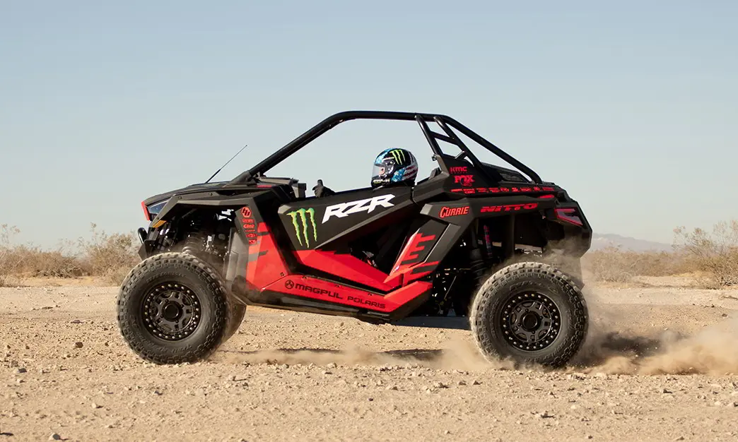 Casey cruising through the desert on his RZR