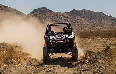 Front view of a RZR in the desert