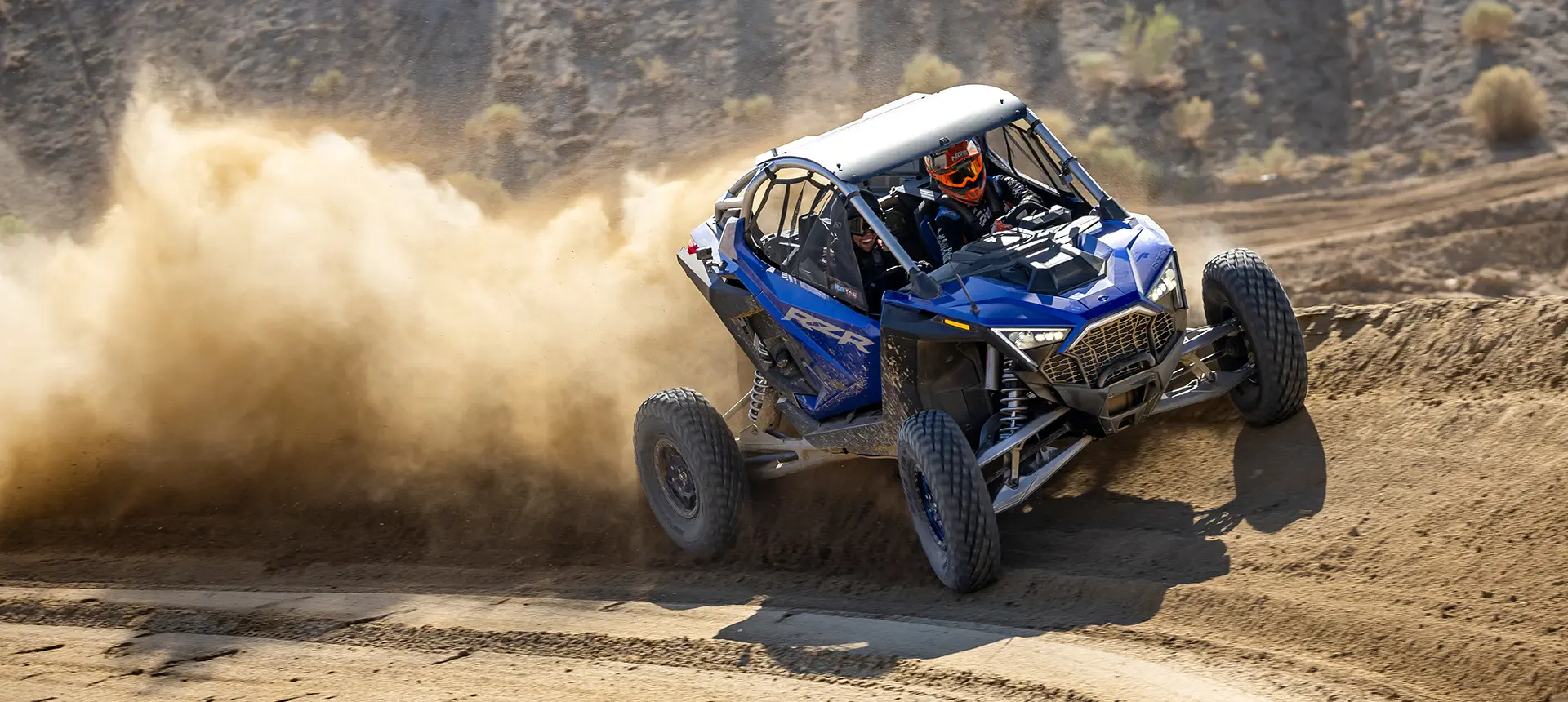RZR Pro R riding on a curve