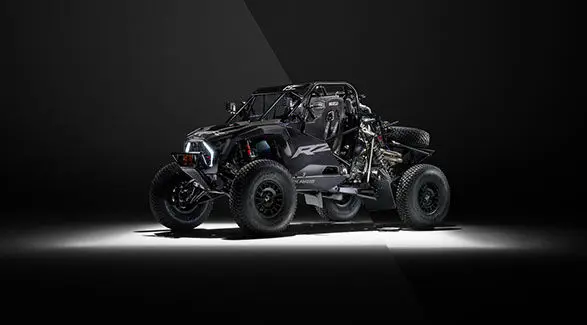 Angle view of the Polaris RZR R Factory Edition split in two showing the exterior and chassis of the vehicle.
