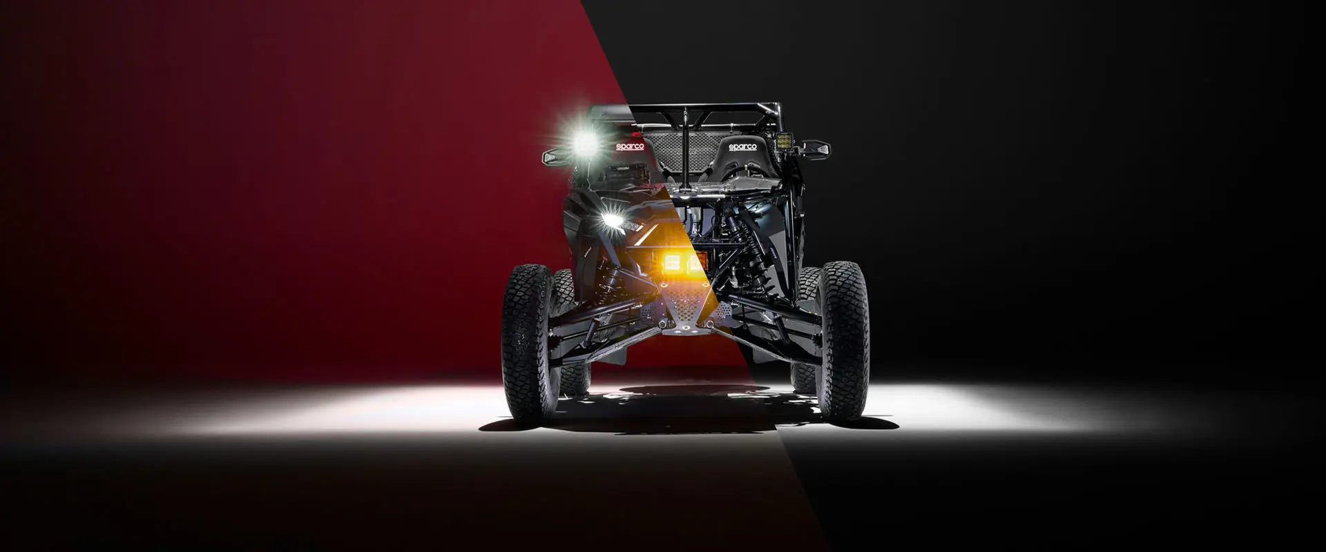 Front view of the Polaris RZR Pro R Factory Edition split in two showing the exterior and chassis of the vehicle.