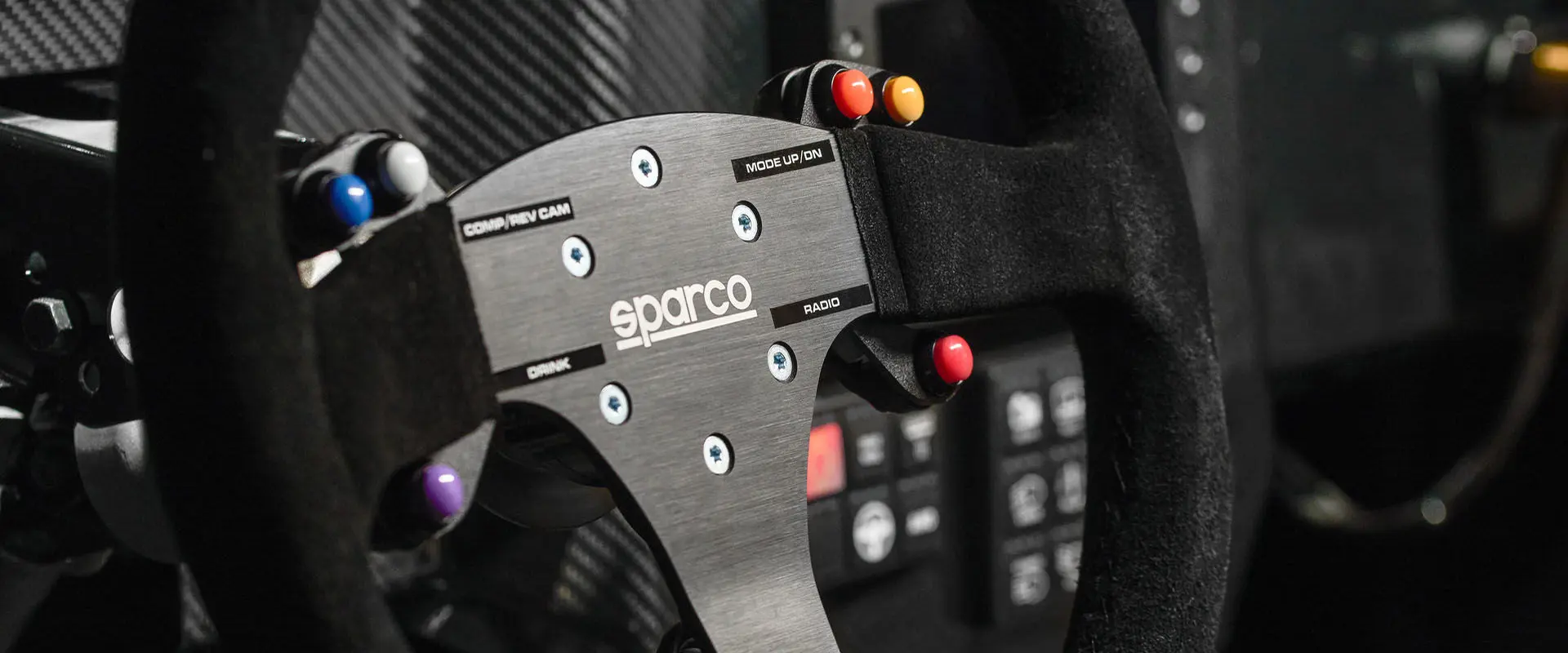 Close-up of the Polaris RZR Pro R Factory Edition steering wheel highlighting SPARCO on the front.