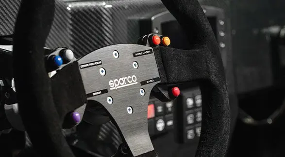 Close-up of the Polaris RZR Pro R Factory Edition steering wheel highlighting SPARCO on the front.
