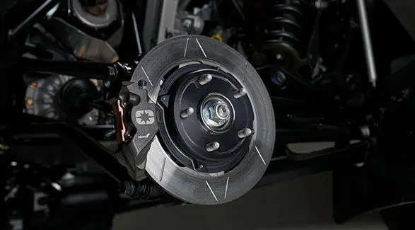 Angle close-up of the disc brake and pads on the Polaris RZR Pro R Factory Edition.