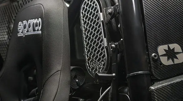 Close-up of the top of the Polaris RZR Pro R Factory Edition seat highlighting the SPARCO branding on it and the ventilation slot on the side.