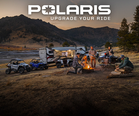 Polaris Upgrade Your Ride Logo, and Polaris RZR side by sides next to a campsite