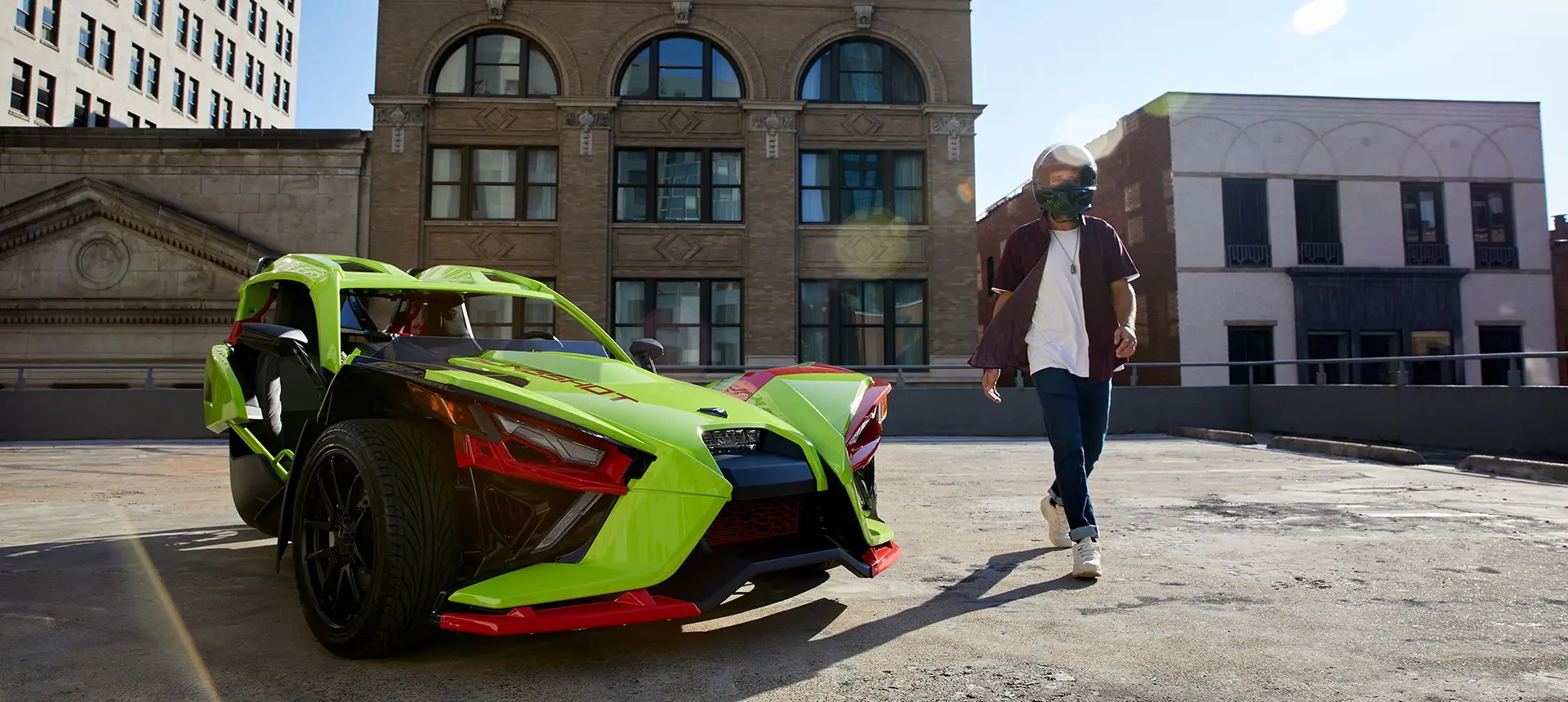 A parked Slingshot R LE vehicle parked on the street