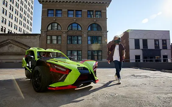 A parked Slingshot R LE vehicle parked on the street
