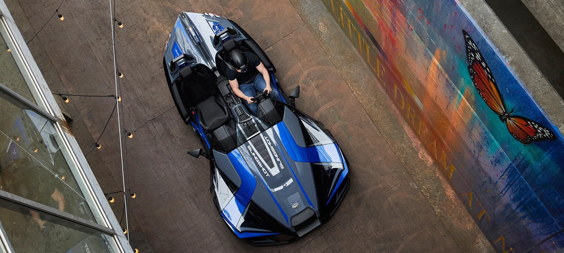 Top view of a Slingshot R vehicle on the road