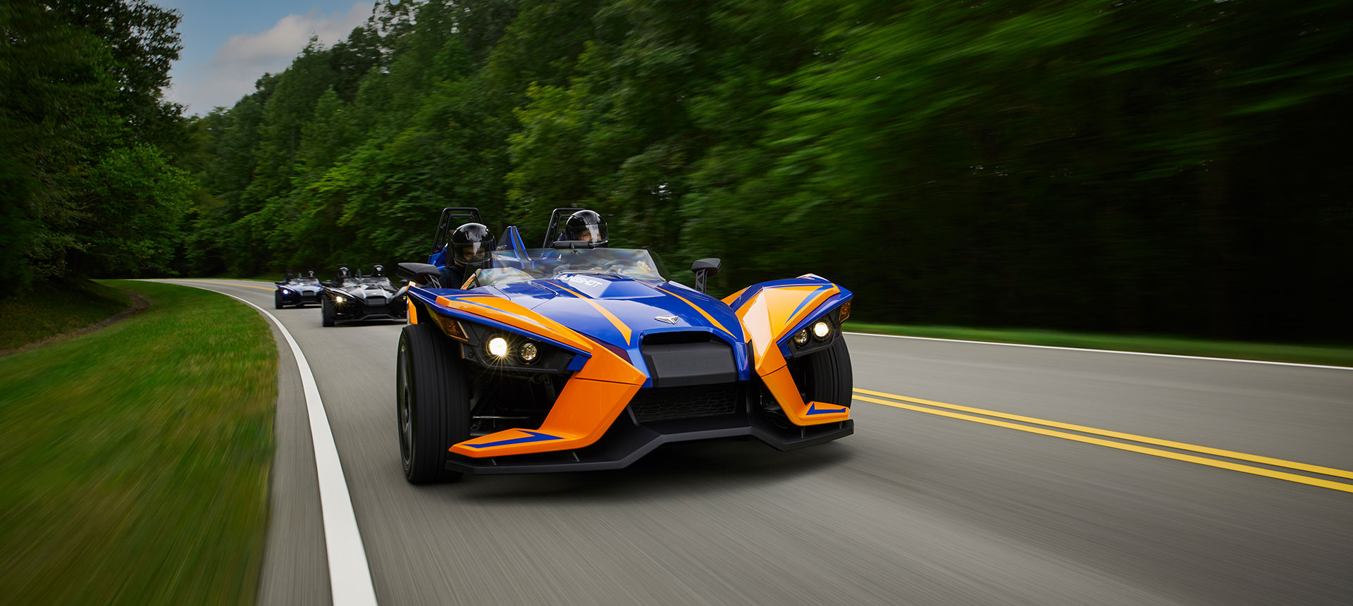 Slingshot R vehicle riding on a road