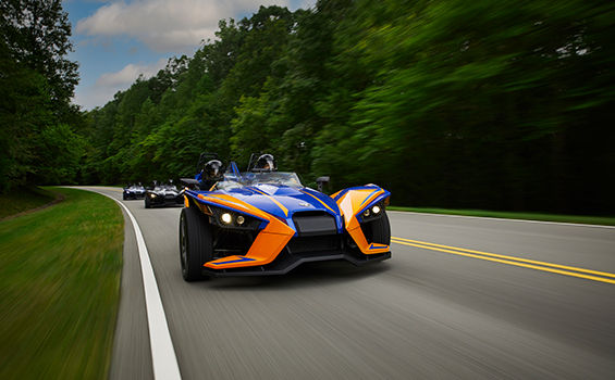 Slingshot R vehicle riding on a road