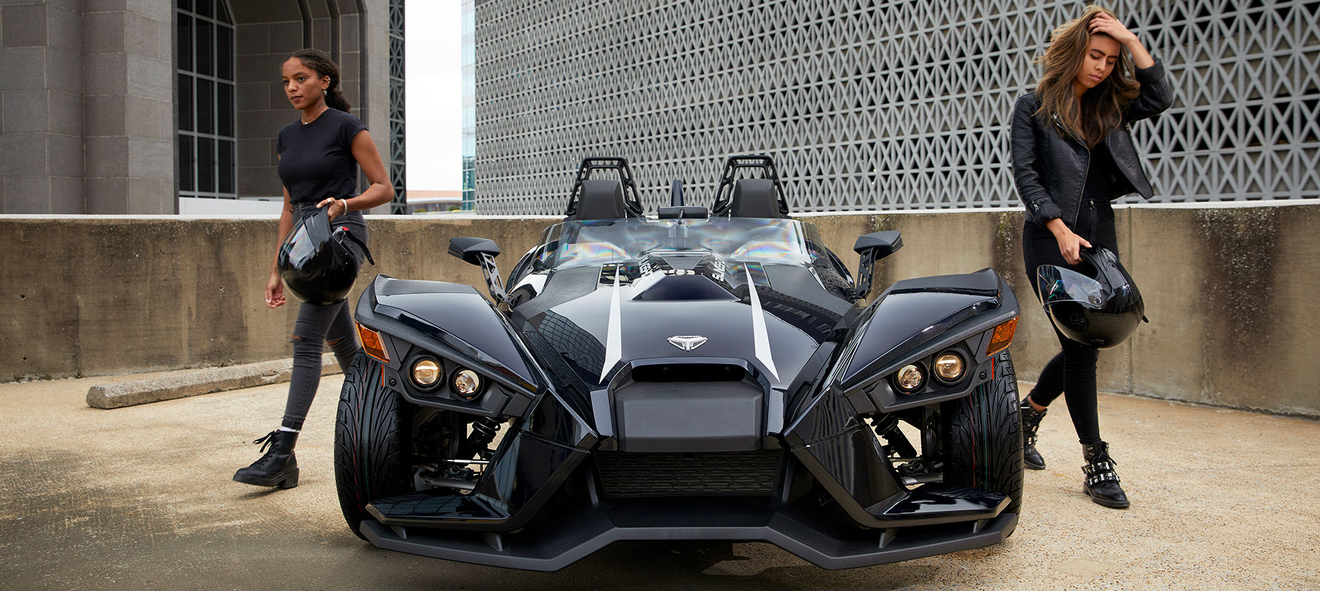 Slingshot racing in a road in the middle of the woods